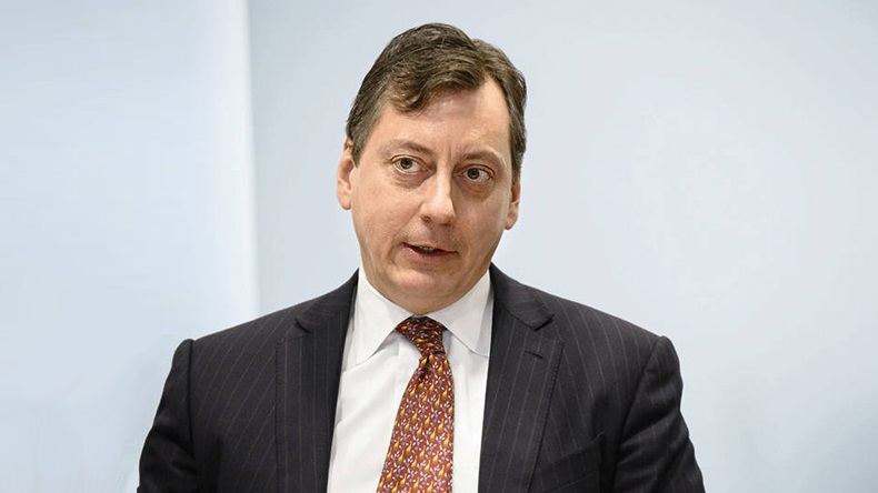 John Dacey, chief financial officer, Swiss Re