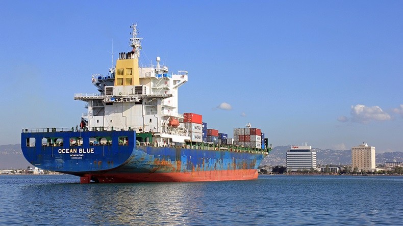 Cargo vessel loading (weerasak saeku/Shutterstock.com)