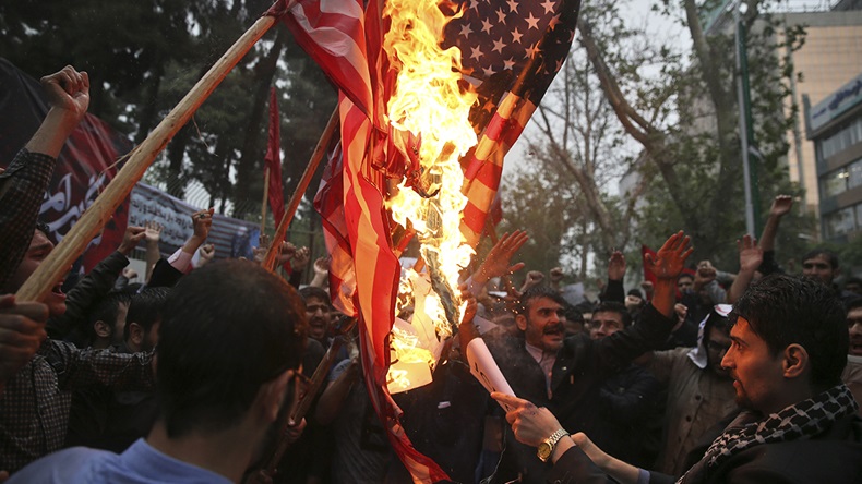 Iran protest flag burning (Vahid Salemi/AP)