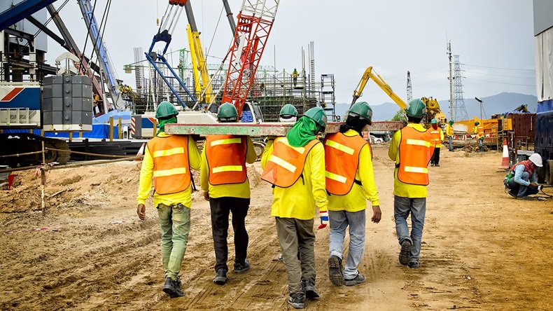 Construction workers (CoolKengzz/Shutterstock.com)
