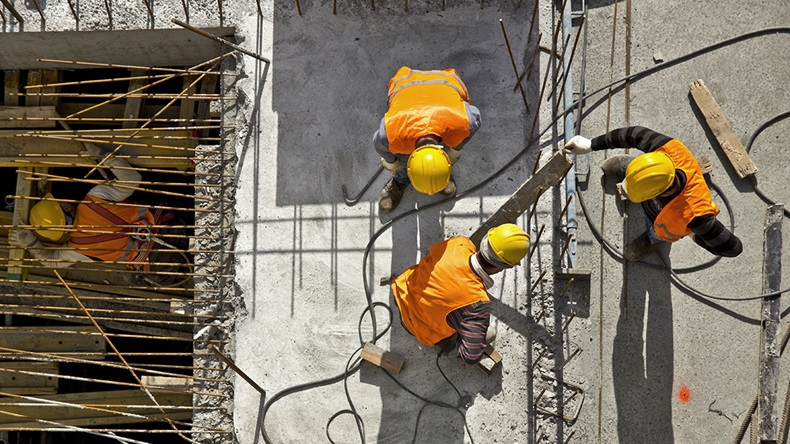 Construction workers ( Mr Ucarer/Shutterstock.com)