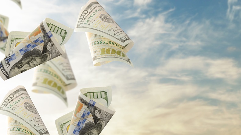 Flying dollars (Anna Aibetova/Shutterstock.com)