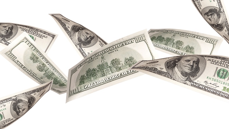 Flying dollars (Boule/Shutterstock.com)