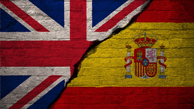UK Spain flags (Andrew Linscott/Shutterstock.com)