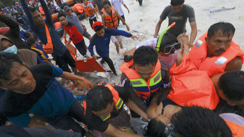Rescuers in Lestari Maju ferry casualty