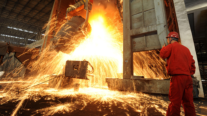 Steel-making factory in Dalian, China with hot metal pouring